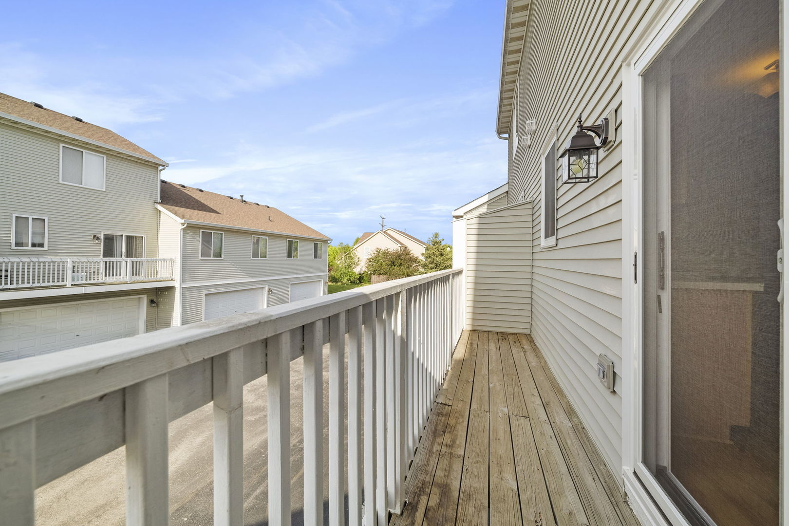 1784 Fieldstone Drive North Shorewood, IL 60404 - Photo 22 of 24 a view of balcony with wooden floor