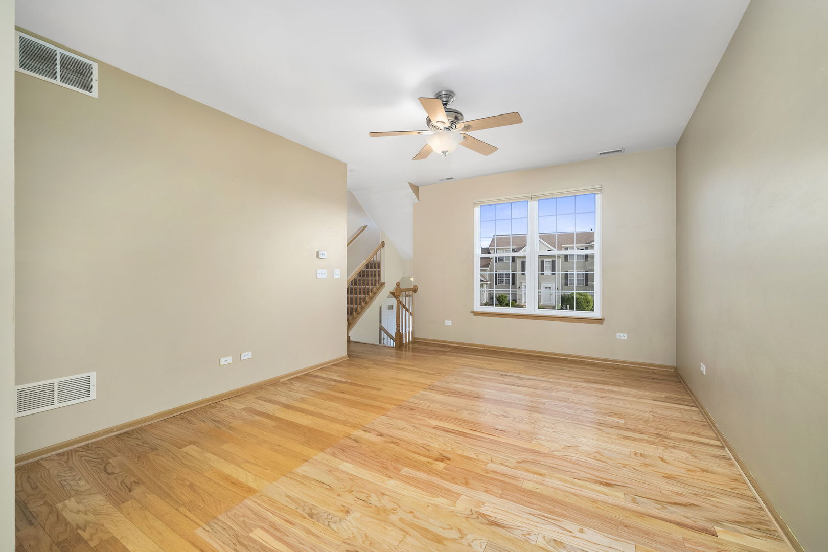 1784 Fieldstone Drive North Shorewood, IL 60404 - Photo 7 of 24 a view of an empty room with a window