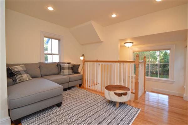 7 St Mary Road Cambridge, MA 02139 - Photo 13 of 24 a living room with a couch and a table