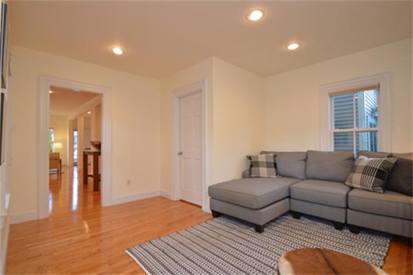 7 St Mary Road Cambridge, MA 02139 - Photo 14 of 24 a living room with furniture and a couch