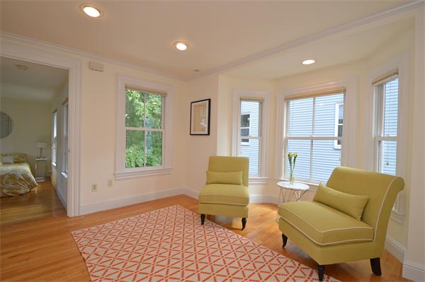 7 St Mary Road Cambridge, MA 02139 - Photo 15 of 24 a living room with furniture and a window