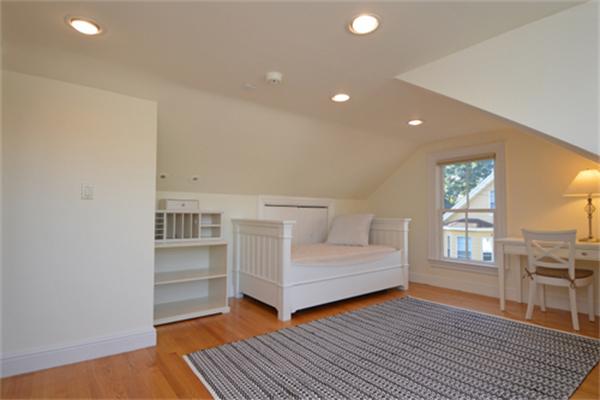 7 St Mary Road Cambridge, MA 02139 - Photo 20 of 24 a living room with furniture and a window