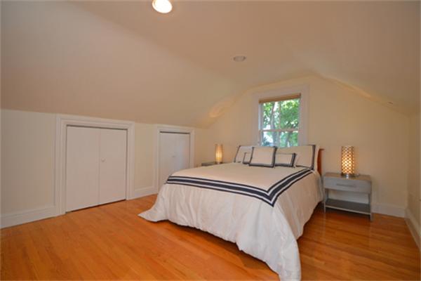 7 St Mary Road Cambridge, MA 02139 - Photo 21 of 24 a bedroom with a bed and window