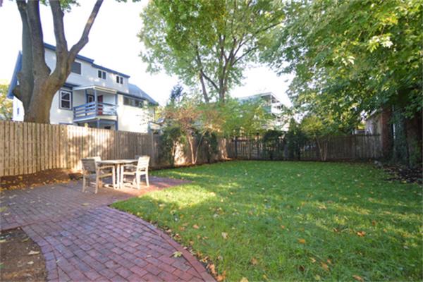 7 St Mary Road Cambridge, MA 02139 - Photo 24 of 24 a view of a chairs and tables in the backyard of the house
