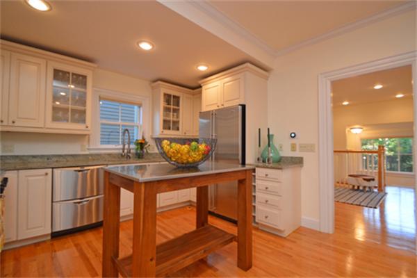 7 St Mary Road Cambridge, MA 02139 - Photo 8 of 24 a kitchen with stainless steel appliances granite countertop a refrigerator and a stove top oven