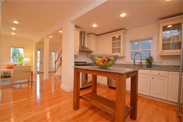 7 St Mary Road Cambridge, MA 02139 - Photo 9 of 24 a kitchen with a sink cabinets and dining table