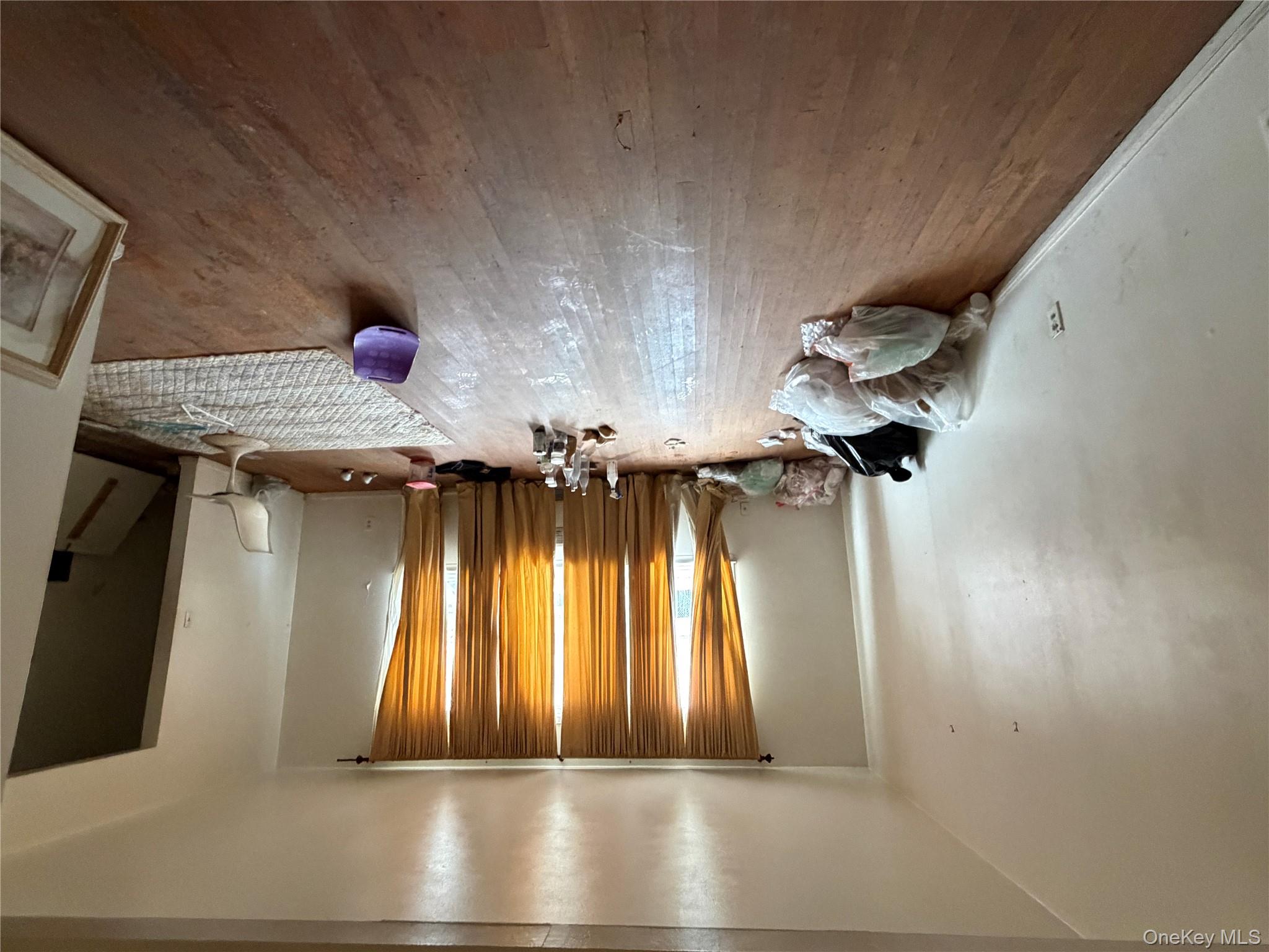 135-26 219th Street Queens, NY 11413 - Photo 19 of 43 a view of a room with gym equipment