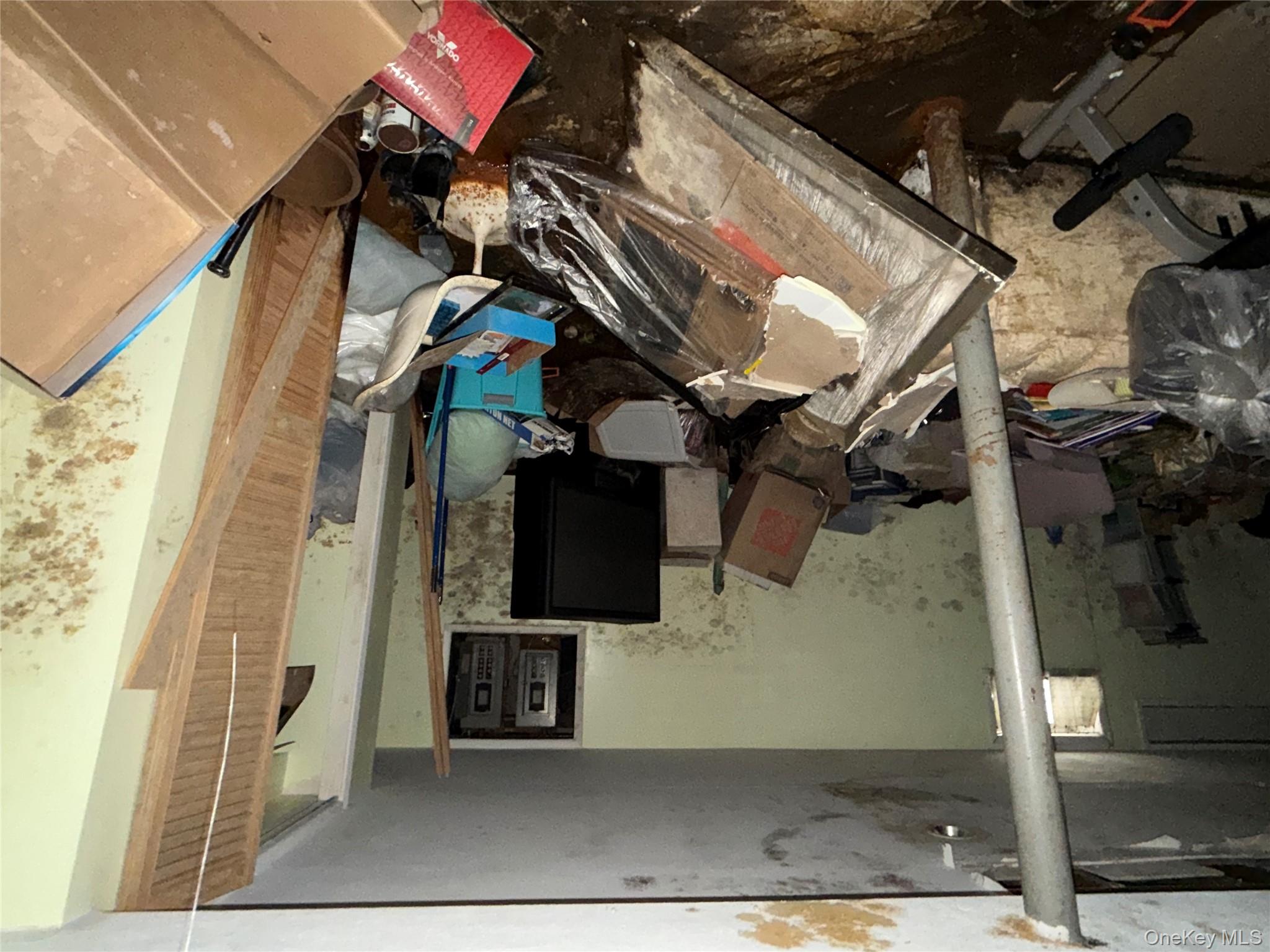 135-26 219th Street Queens, NY 11413 - Photo 23 of 43 a view of a workspace with furniture and a window