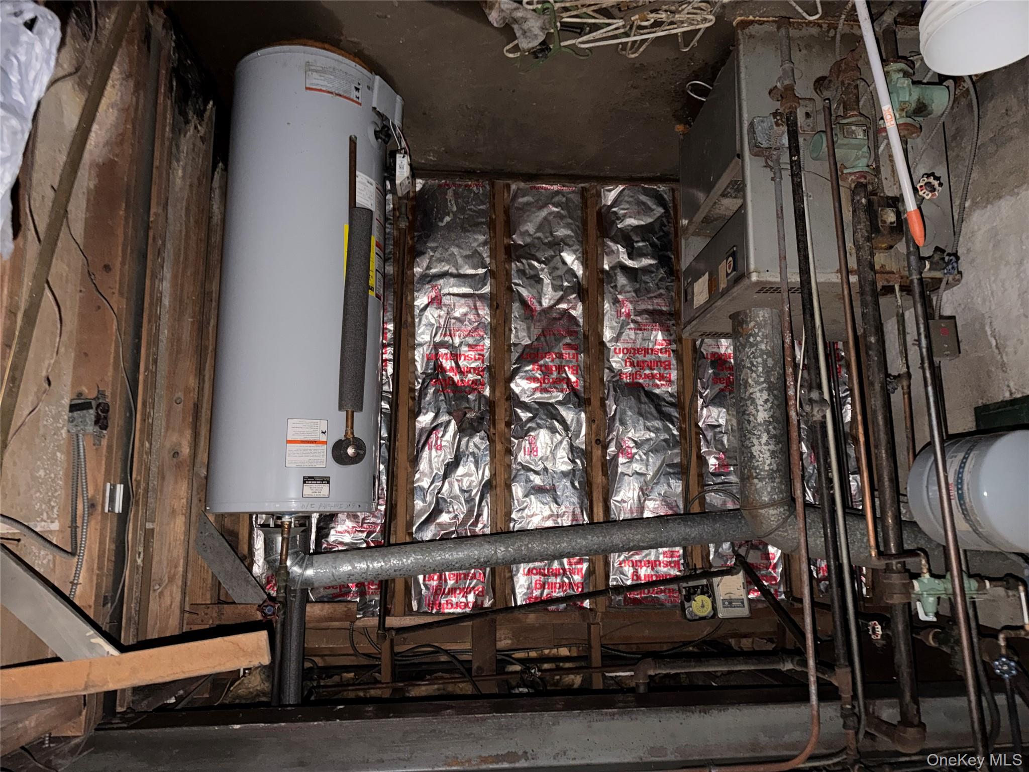 135-26 219th Street Queens, NY 11413 - Photo 26 of 43 a view of water heater room