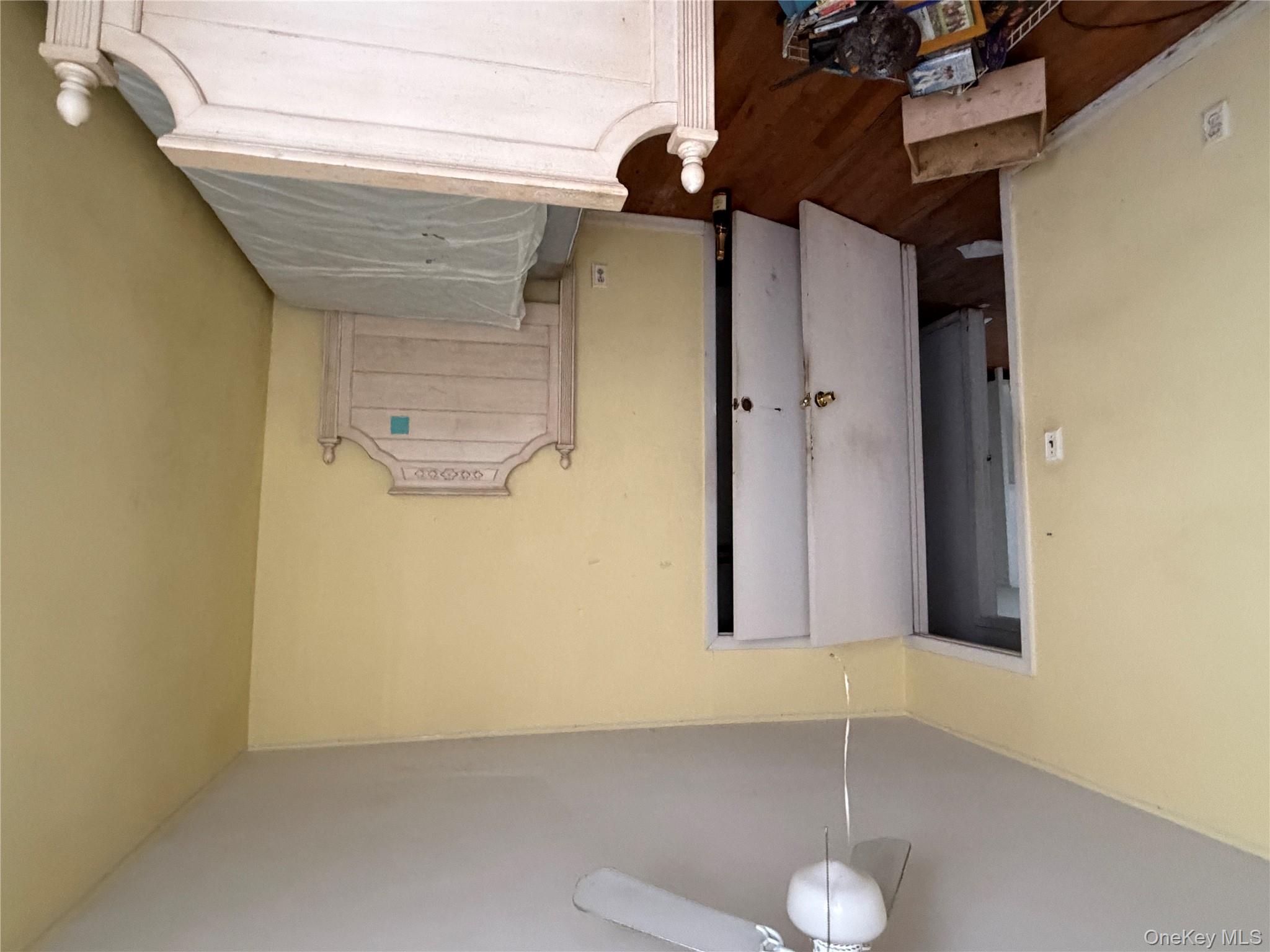 135-26 219th Street Queens, NY 11413 - Photo 33 of 43 a room with a chandelier