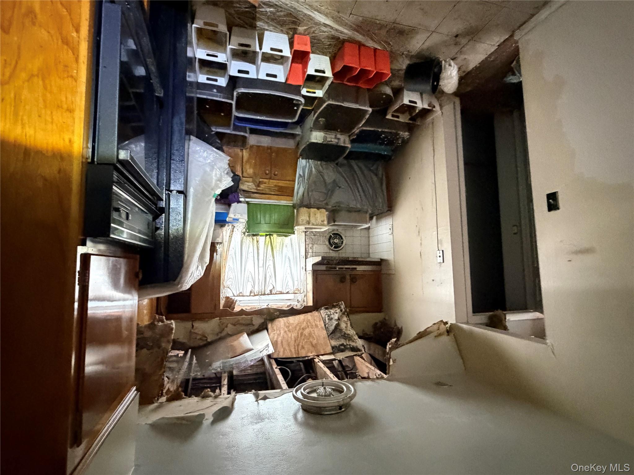 135-26 219th Street Queens, NY 11413 - Photo 40 of 43 a view of walk in closet with clothes and shoes