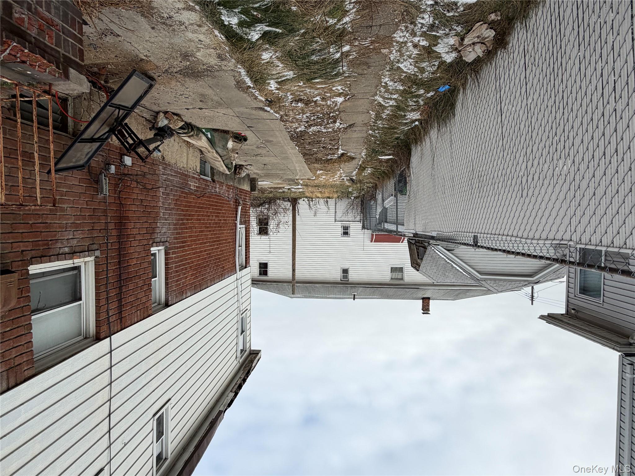 135-26 219th Street Queens, NY 11413 - Photo 5 of 43 a view of a backyard with sitting area