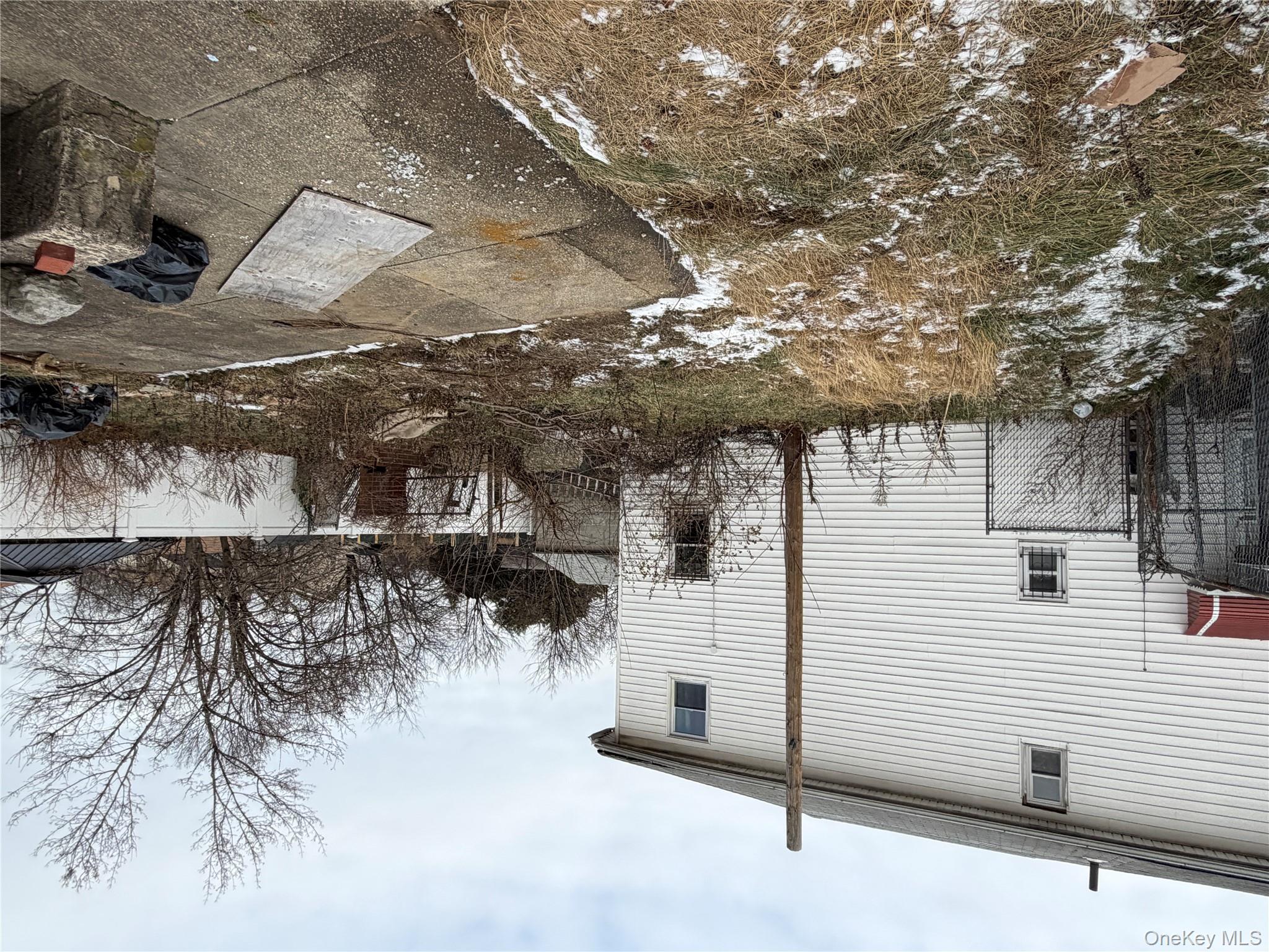 135-26 219th Street Queens, NY 11413 - Photo 6 of 43 a view of a outdoor space