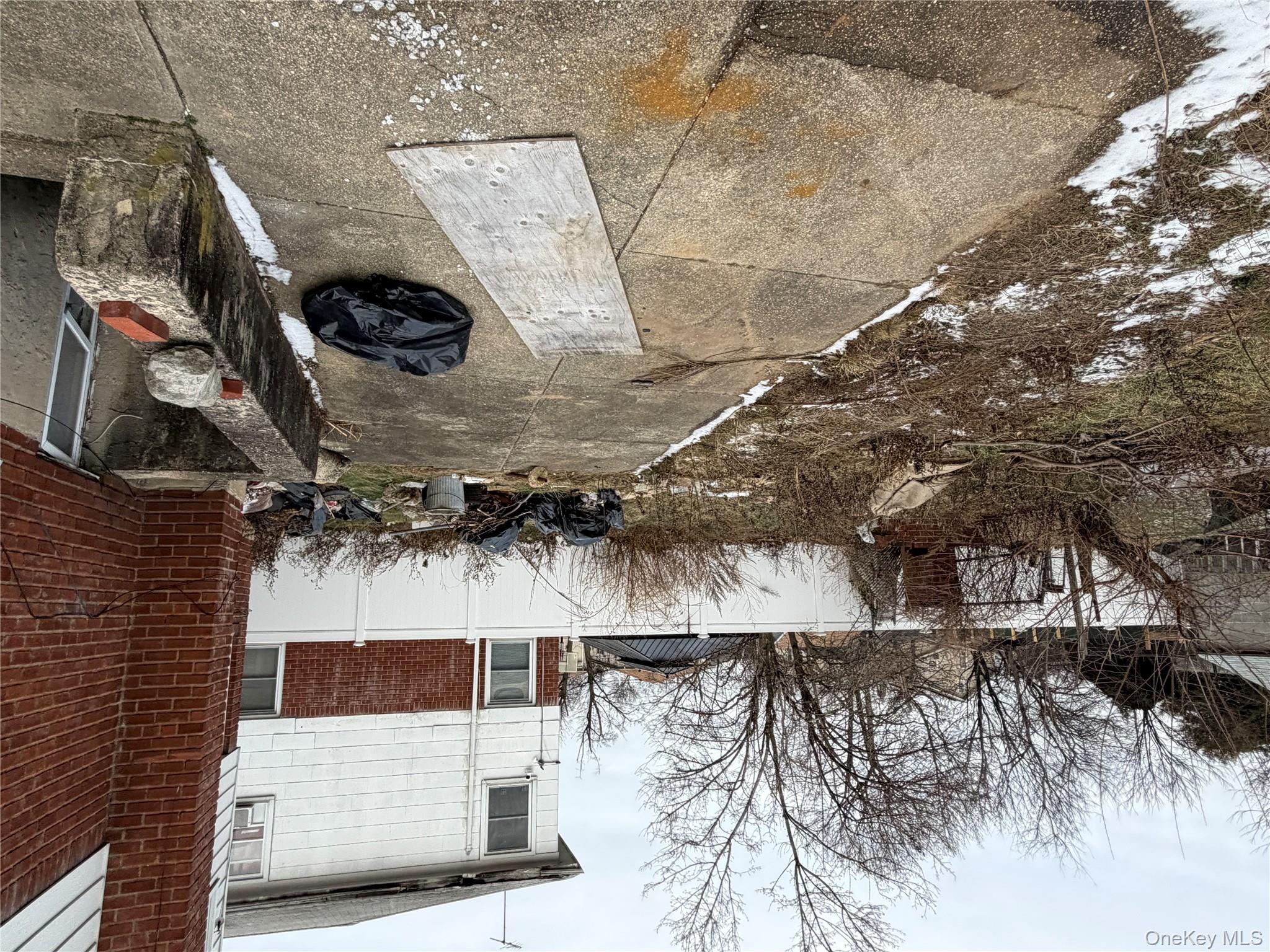 135-26 219th Street Queens, NY 11413 - Photo 7 of 43 a view of a backyard with a stove