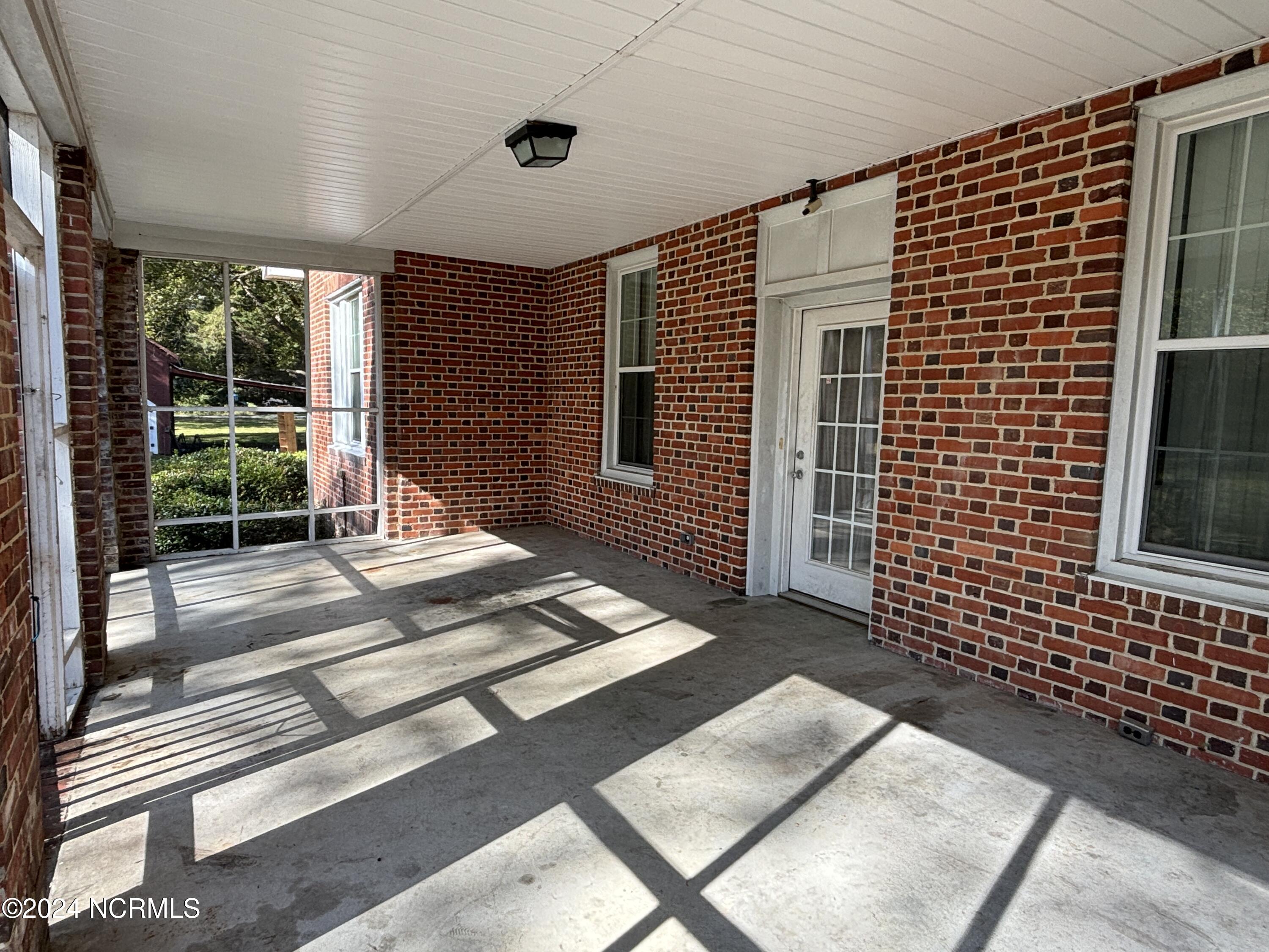 24661 Spring Hill Road Wagram, NC 28396 - Photo 4 of 20 Screened Porch