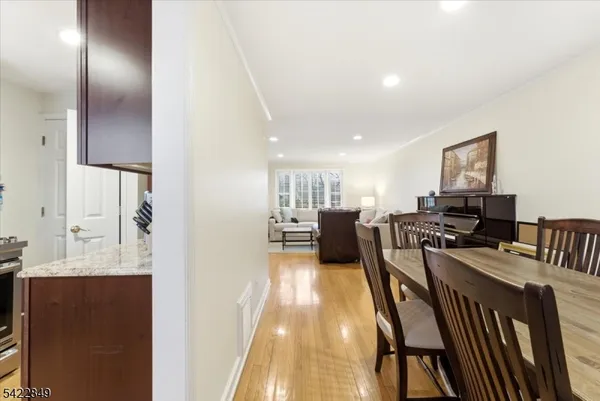 a view of a living room and dining room