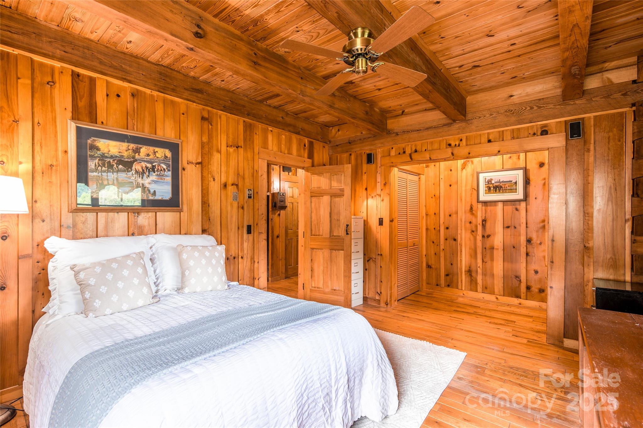 83 Daybreak Ridge Sylva, NC 28779 - Photo 16 of 40 a bedroom with a bed and a shower