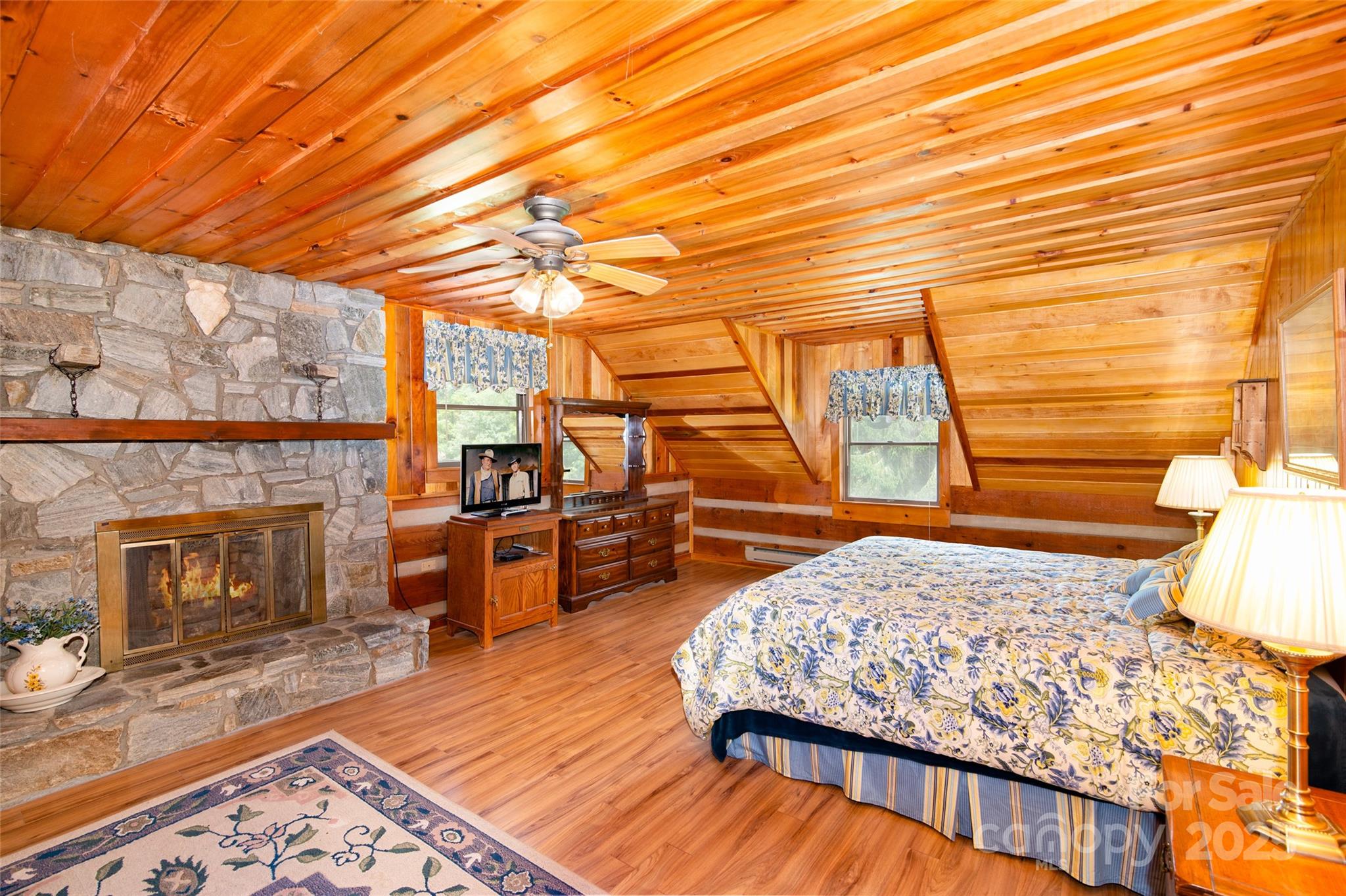 83 Daybreak Ridge Sylva, NC 28779 - Photo 19 of 40 a living room with furniture and a fireplace