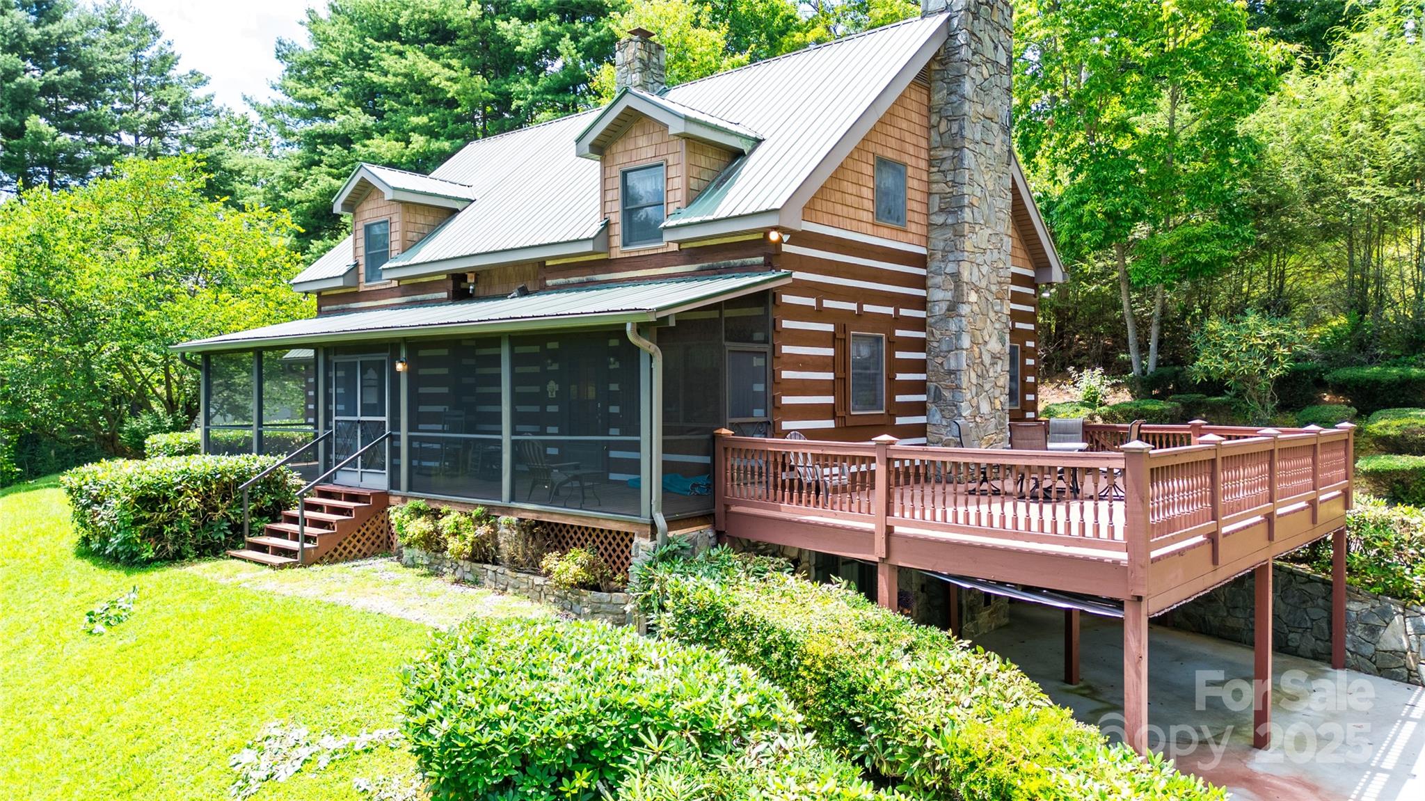 83 Daybreak Ridge Sylva, NC 28779 - Photo 2 of 40 a view of a house with a yard and wooden fence
