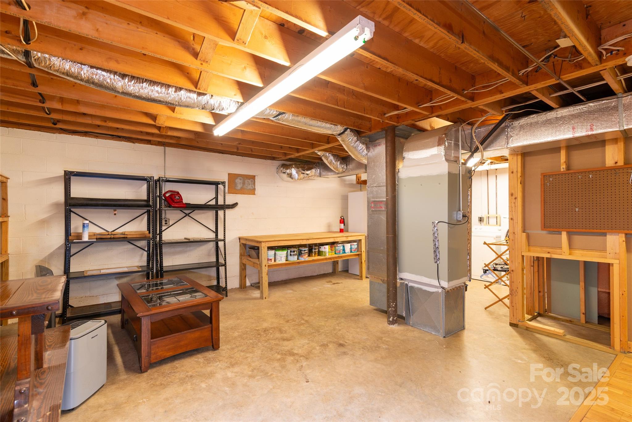 83 Daybreak Ridge Sylva, NC 28779 - Photo 25 of 40 a view of a storage room with windows