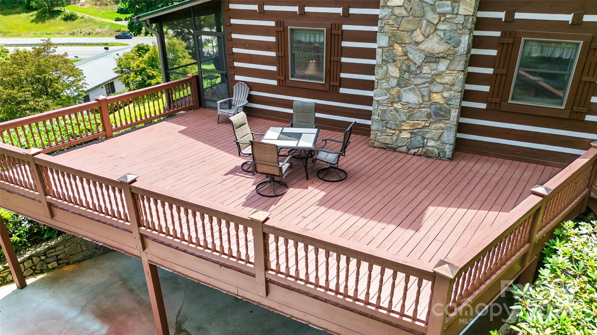 83 Daybreak Ridge Sylva, NC 28779 - Photo 28 of 40 a balcony with table and chairs