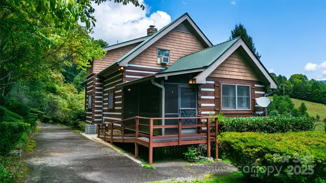 a front view of a house with garage