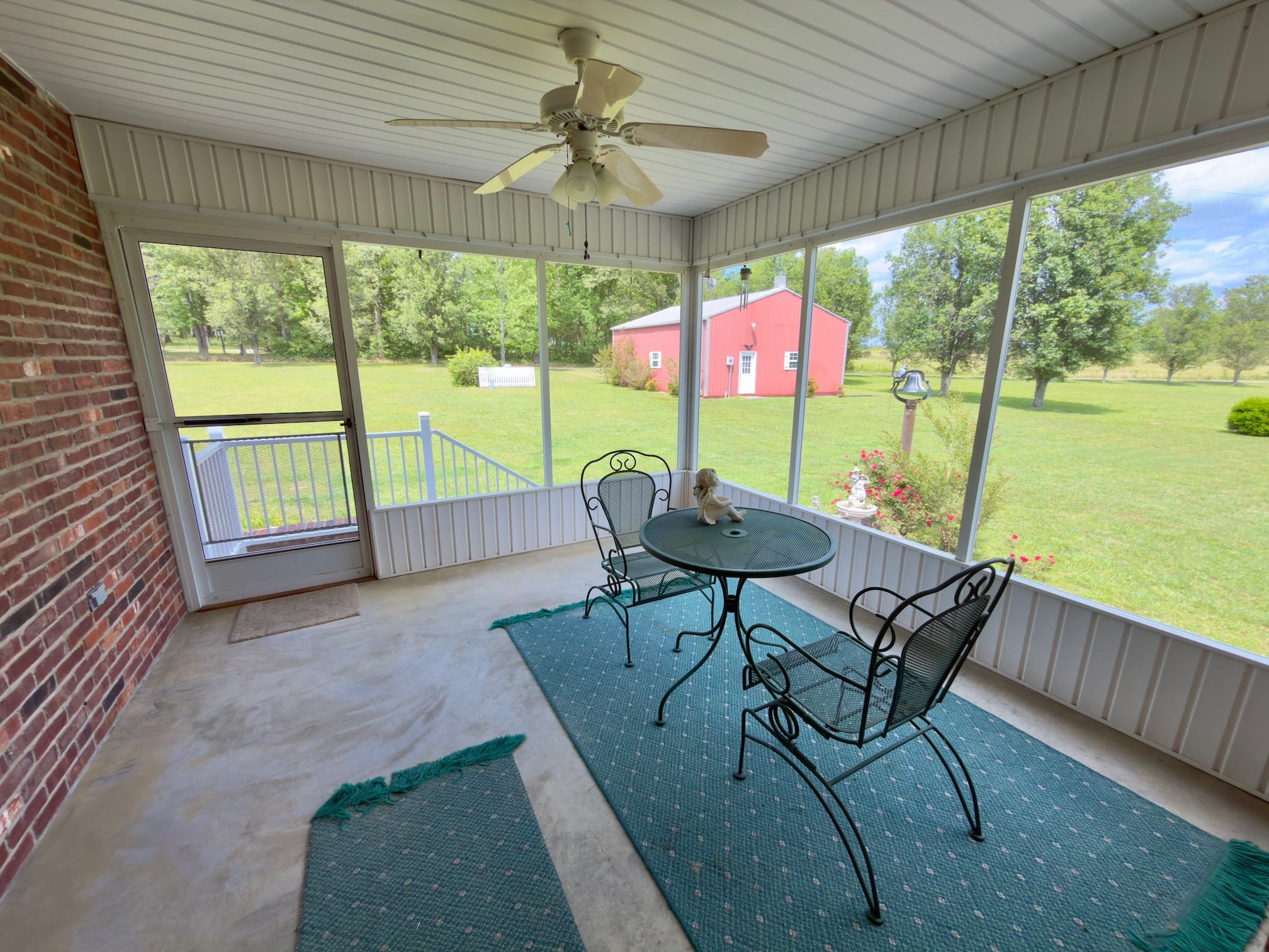 4929 Fountain Grove Road Morrison, TN 37357 - Photo 19 of 33 a view of a patio with a table chairs and backyard