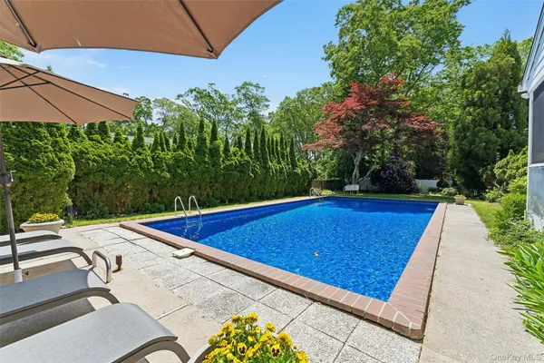 a view of outdoor space and swimming pool