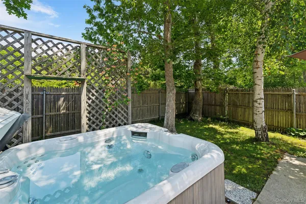 a view of backyard with green space