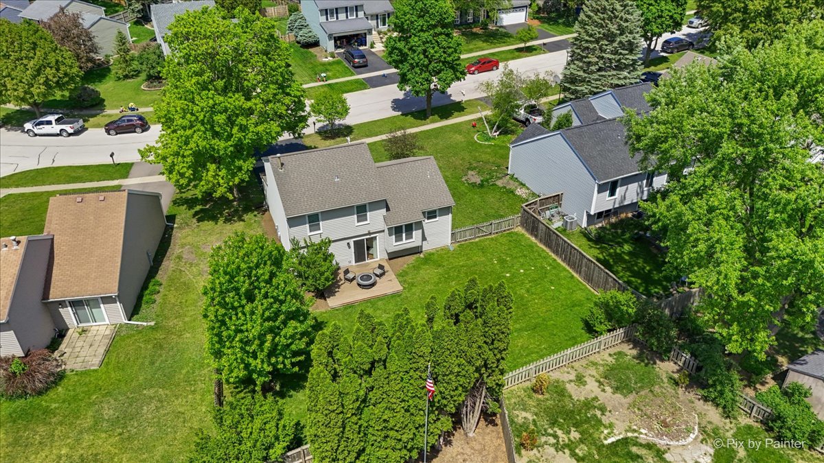 1150 Appleton Lane Geneva, IL 60134 - Photo 7 of 43 an aerial view of residential house with outdoor space and trees all around