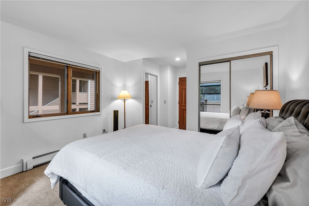 931 Incline Way, Unit 231 Incline Village, NV 89451 - Photo 20 of 39 a bedroom with a bed and window