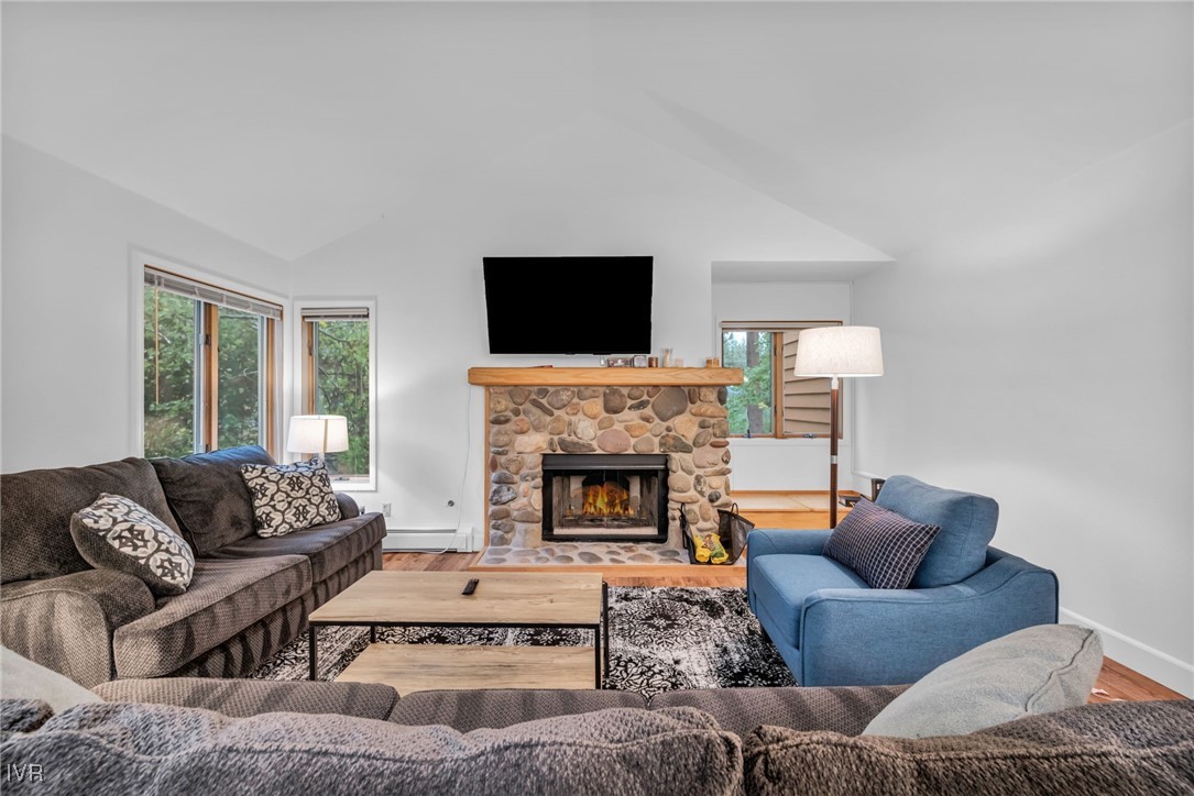 931 Incline Way, Unit 231 Incline Village, NV 89451 - Photo 37 of 39 a living room with furniture and a fireplace