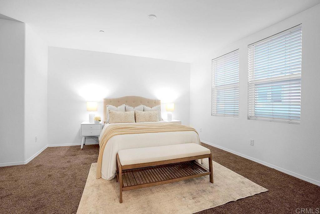 1541 Winter Lane, Unit 4 Chula Vista, CA 91915 - Photo 11 of 23 a bedroom with a bed and a window
