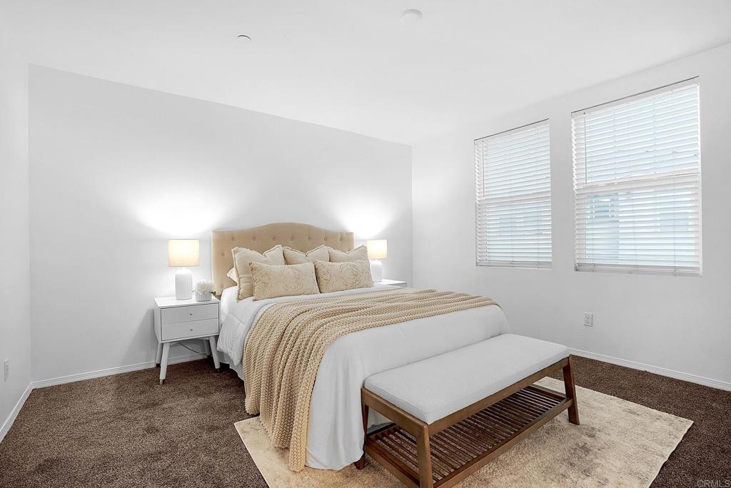 1541 Winter Lane, Unit 4 Chula Vista, CA 91915 - Photo 12 of 23 a bedroom with a bed and a window