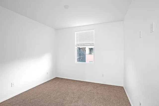 an empty room with a window