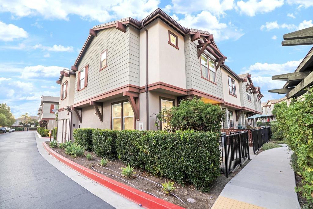 1541 Winter Lane, Unit 4 Chula Vista, CA 91915 - Photo 20 of 23 a view of a street with plants and large trees