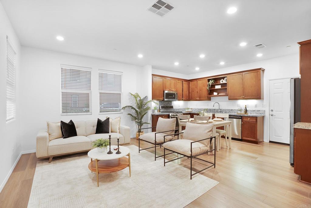 1541 Winter Lane, Unit 4 Chula Vista, CA 91915 - Photo 2 of 23 a living room with furniture and kitchen view