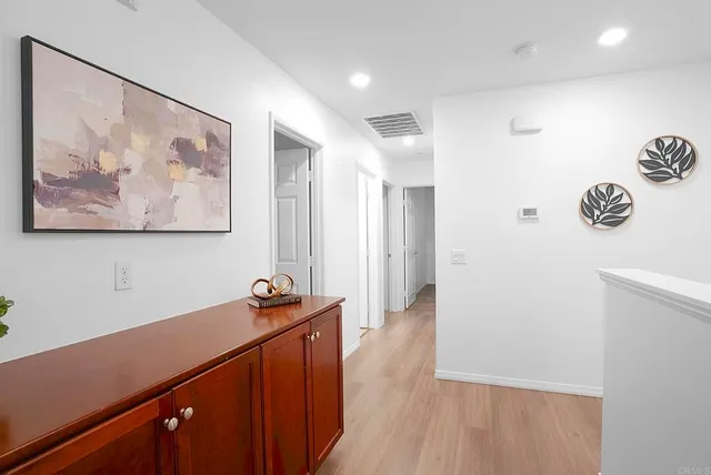a view of a hallway with workspace