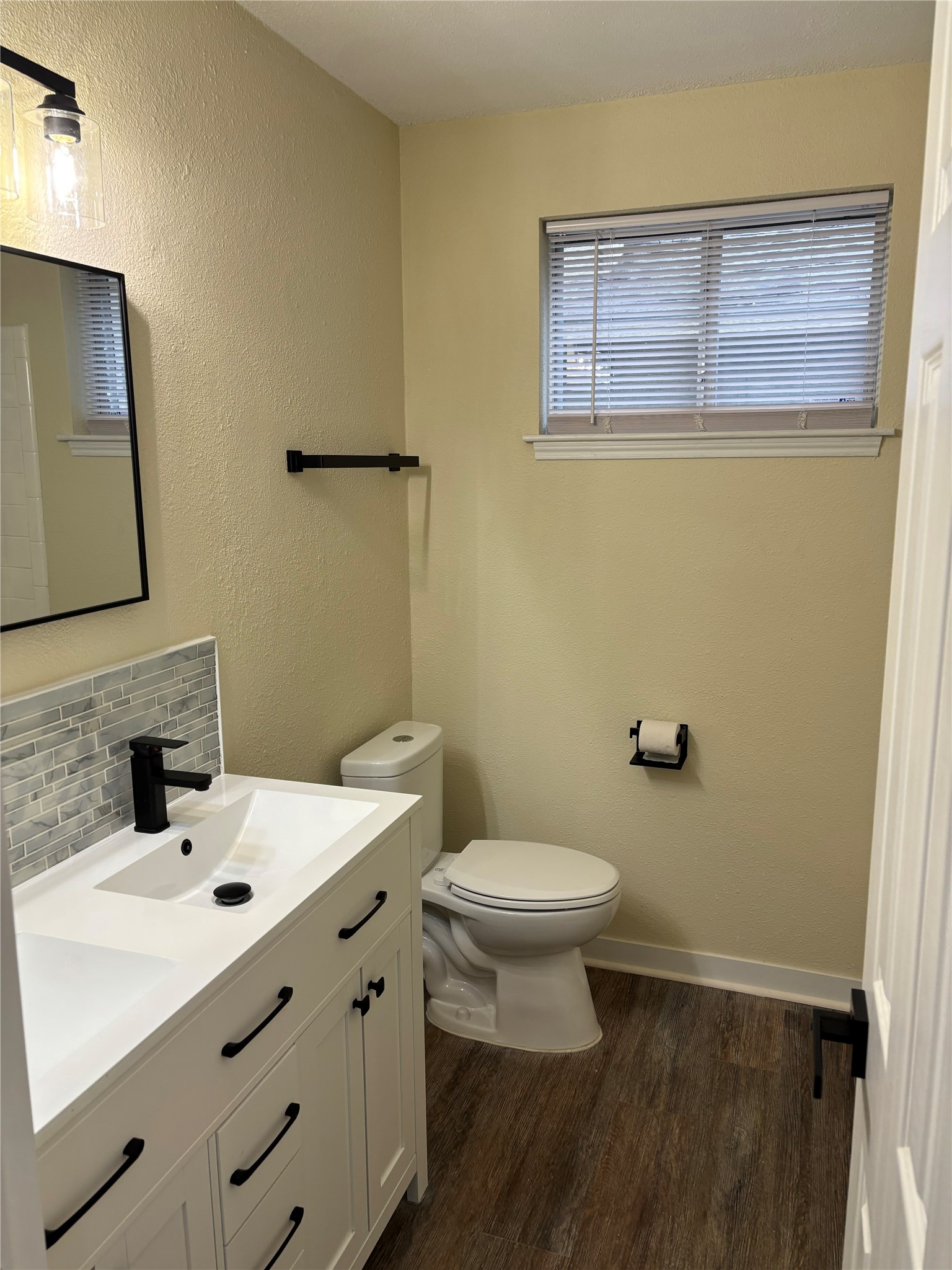 23726 Farm Hill Drive Spring, TX 77373 - Photo 8 of 11 a bathroom with a sink and a mirror
