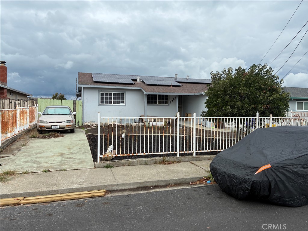 2267 Highlands Road San Pablo, CA 94806 - Photo 2 of 2 a view of a house with a wooden fence