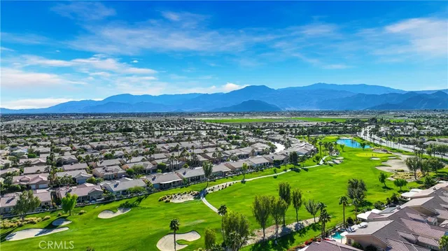 a view of a city with mountains in the background