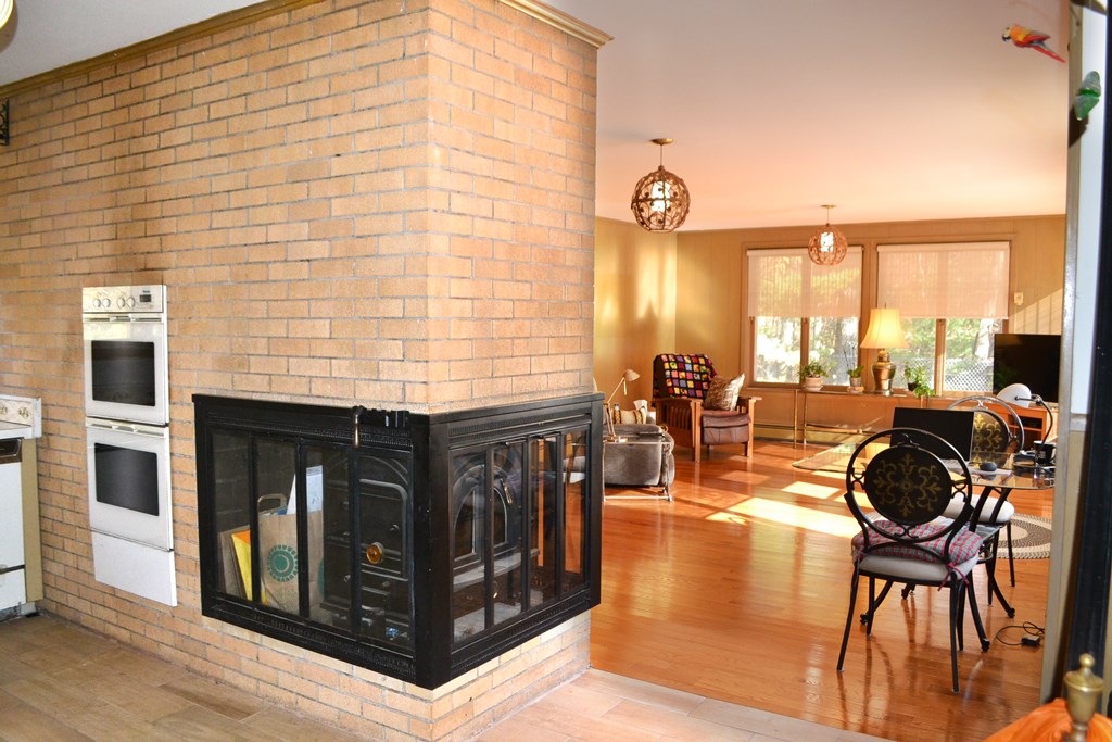 328 Angell Road Lincoln, RI 02865 - Photo 13 of 38 Family room off kitchen with new hardwood floors