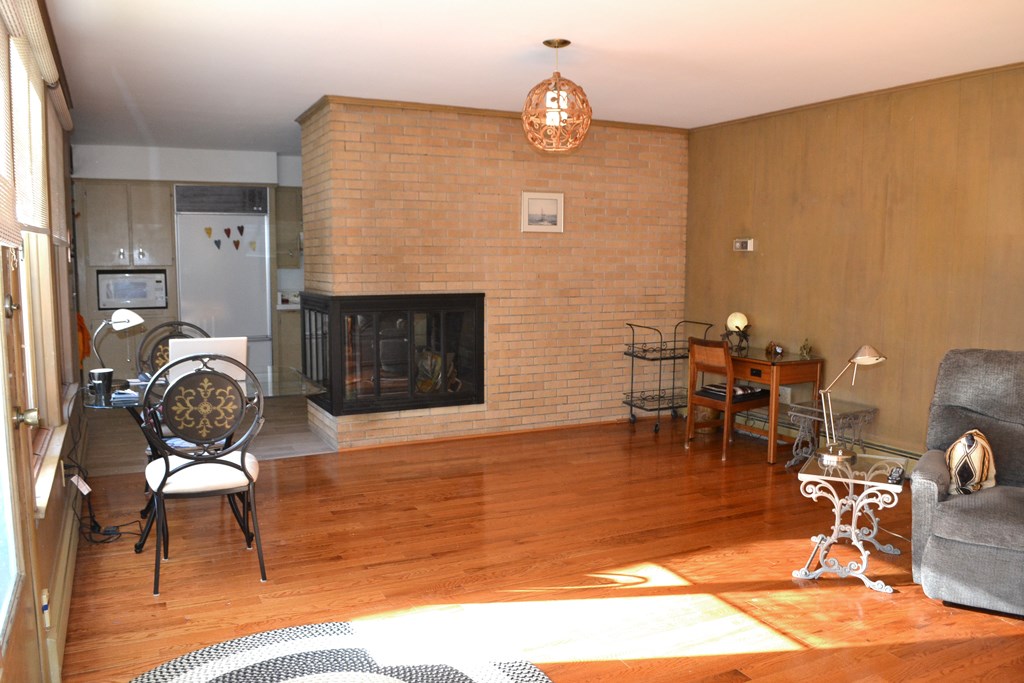 328 Angell Road Lincoln, RI 02865 - Photo 14 of 38 Family room from entrance door off porch looking toward the kitchen