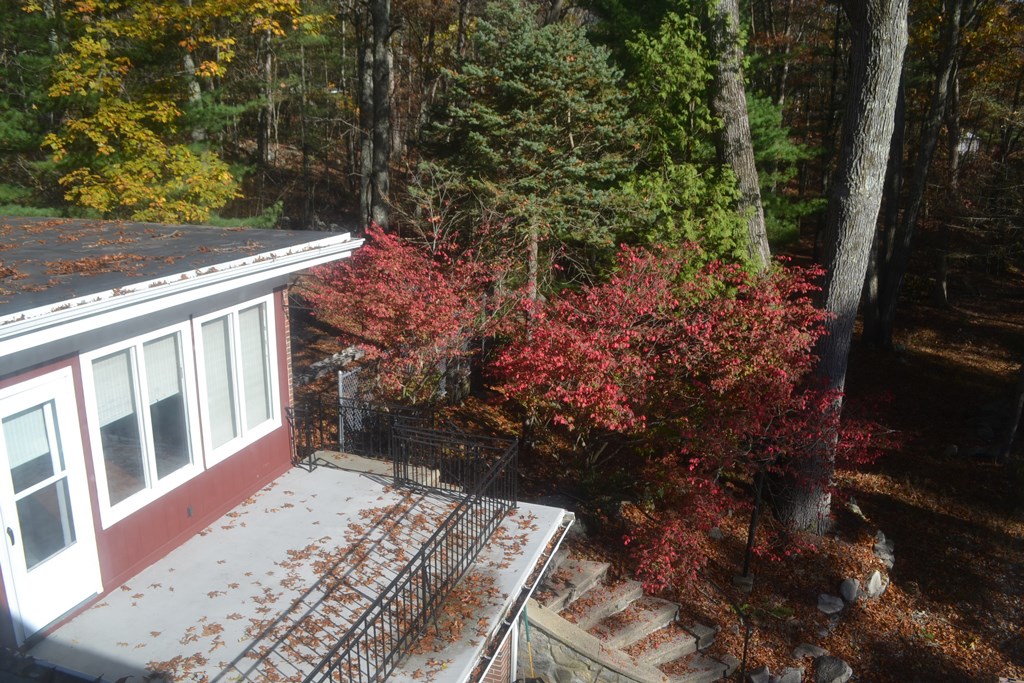 328 Angell Road Lincoln, RI 02865 - Photo 26 of 38 View out one of the second floor bedrooms of the porch and woods