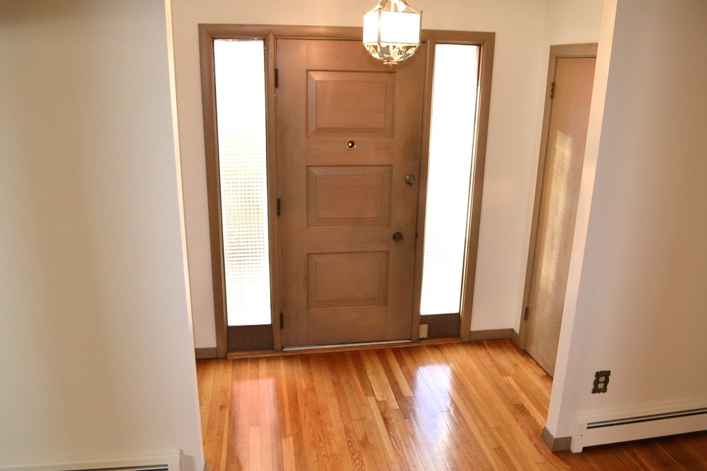 328 Angell Road Lincoln, RI 02865 - Photo 5 of 38 Front door with coat closets on either side