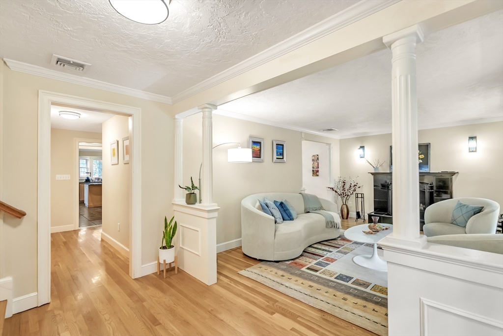 10 Ballard Terrace Lexington, MA 02420 - Photo 2 of 42 a living room with furniture and a wooden floor