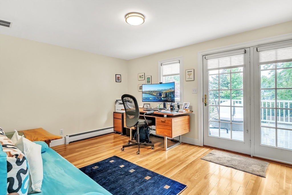 10 Ballard Terrace Lexington, MA 02420 - Photo 21 of 42 a view of a workspace with furniture and a window