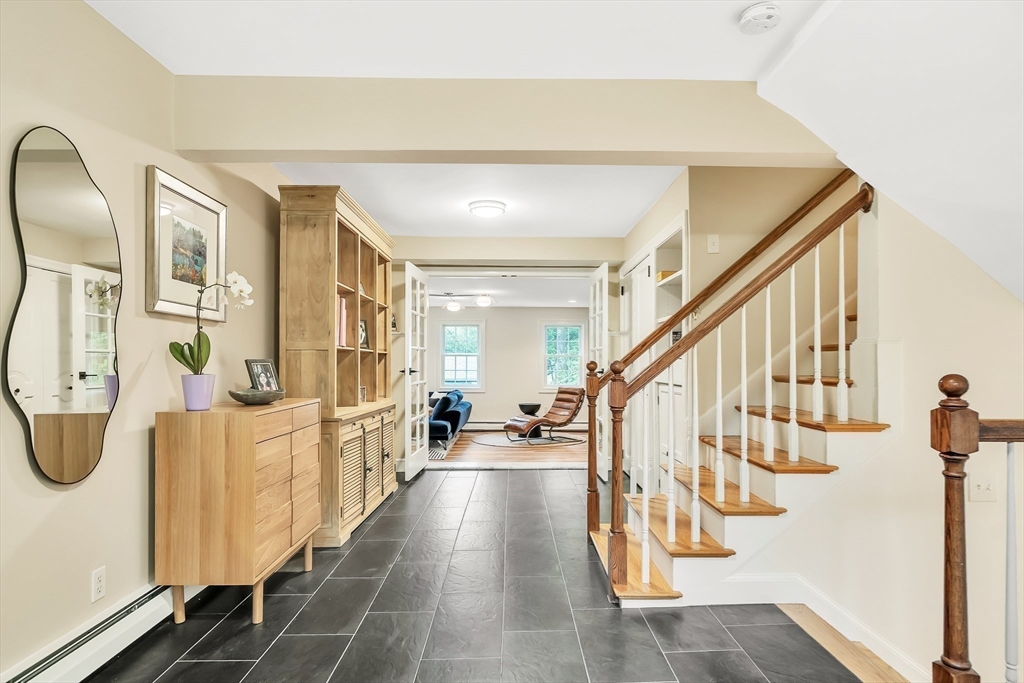 10 Ballard Terrace Lexington, MA 02420 - Photo 25 of 42 a view of entryway and hall with wooden floor