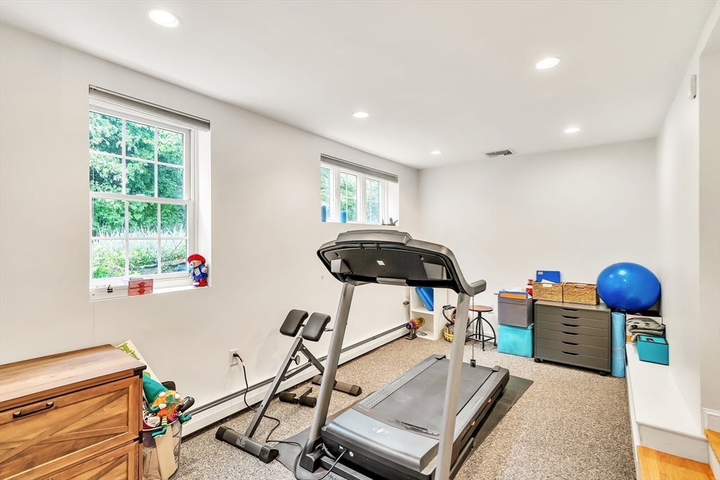 10 Ballard Terrace Lexington, MA 02420 - Photo 29 of 42 a room with furniture and gym equipment