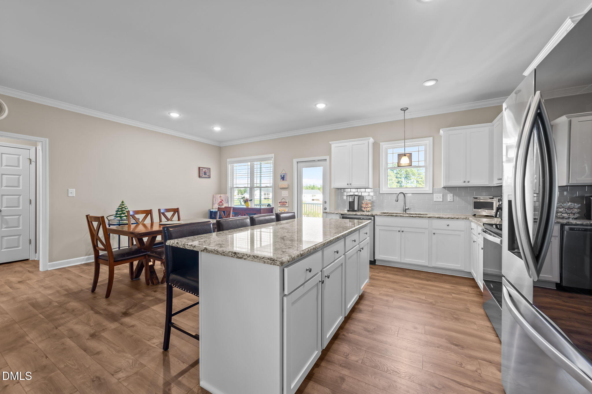 73 Rabbit Run Drive Smithfield, NC 27577 - Photo 13 of 46 a kitchen with appliances a sink a counter top space and cabinets